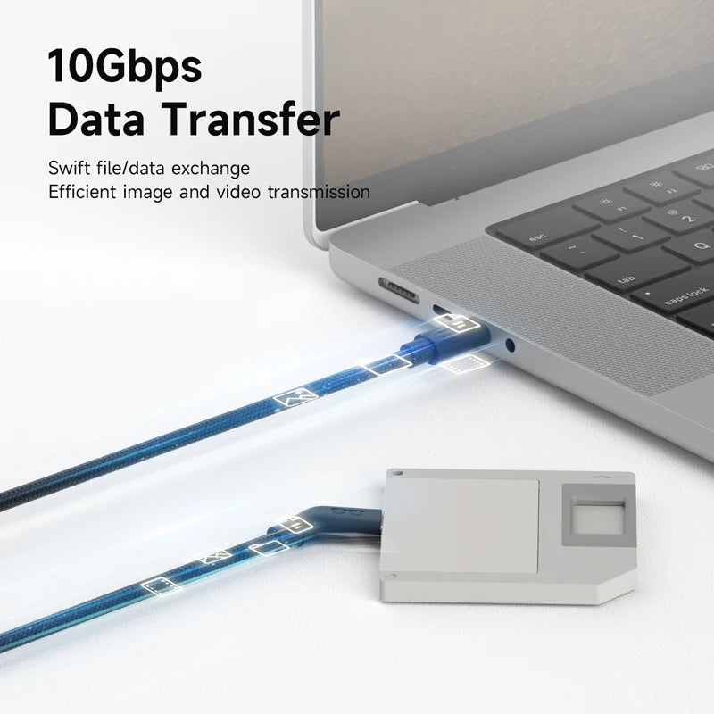 Laptop with a USB drive connected, emphasizing 10Gbps data transfer capabilities.
