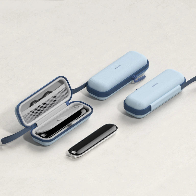A set of light blue and navy protective cases for smartwatches, including one open case showing a black smartwatch inside, two closed cases, and a separate black smartwatch on a light beige textured background.