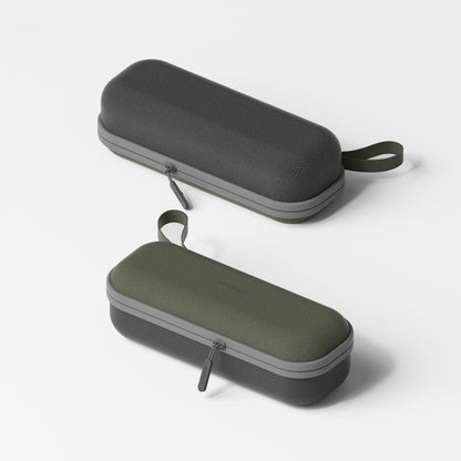 Two gray and green carrying cases on a white background