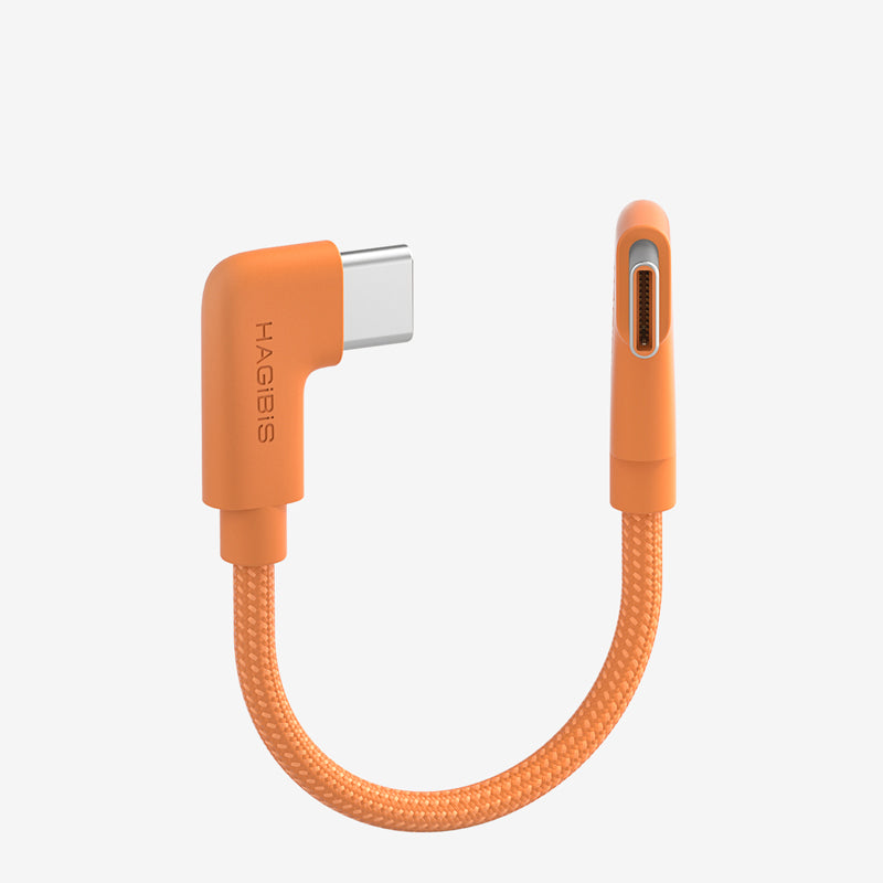 An orange braided USB-C to USB-C adapter cable by HAGGIS, shown on a clean, light gray background.