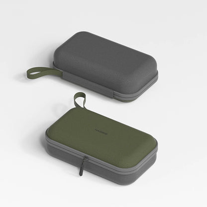 Two carrying cases, one gray and one green, on a light gray background.