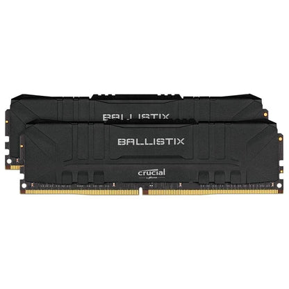 Two black Ballistix Crucial RAM modules with gold-plated gold memory pins, shown on a plain white background.