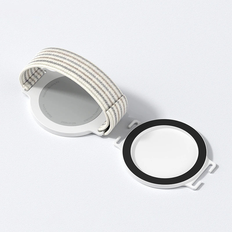 A white round smartwatch shown on a clean white background, with a striped fabric strap attached on one side and a separate black-rimmed circular component beside it.