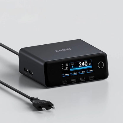 A 240W multi-port USB charger with a digital display screen showing power details, shown with its power cable on a light gray background.