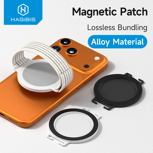 HAGIBIS magnetic phone case accessory set shown on an orange smartphone, including a white elastic band, a black circular magnetic patch, and a white circular magnetic patch with black rim. Text reads 'Magnetic Patch', 'Lossless Bundling', and 'Alloy Material'.