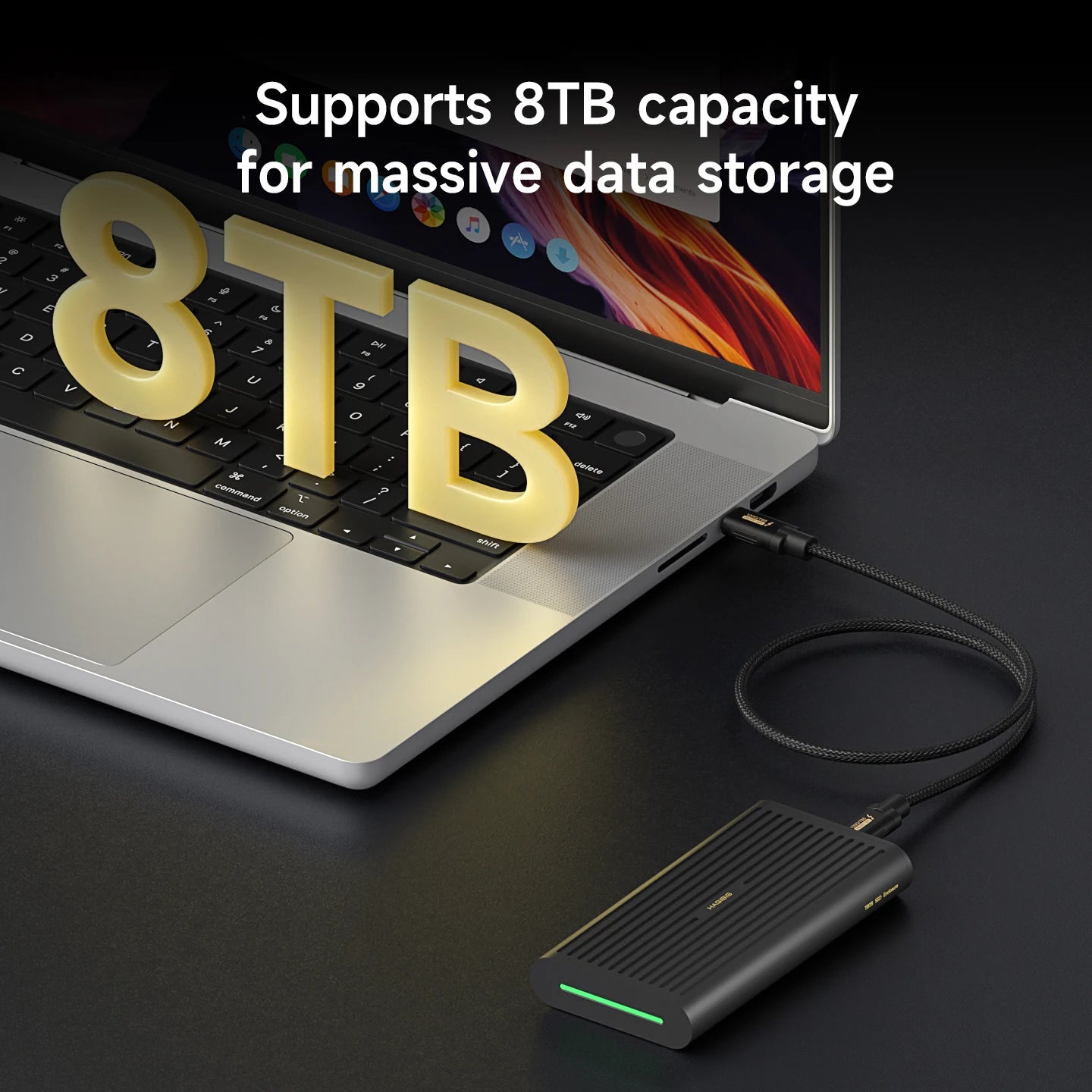 Laptop with 8TB external hard drive connected, emphasizing storage capacity.