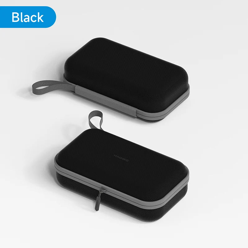 Two black carrying cases with gray handles on a white background