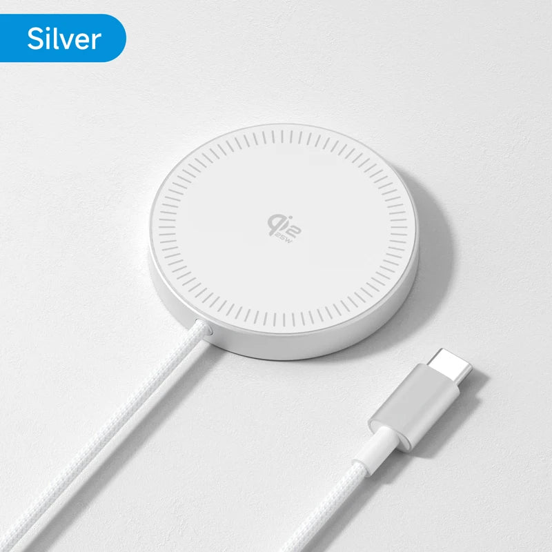 Silver wireless charging pad with cable on a light gray background