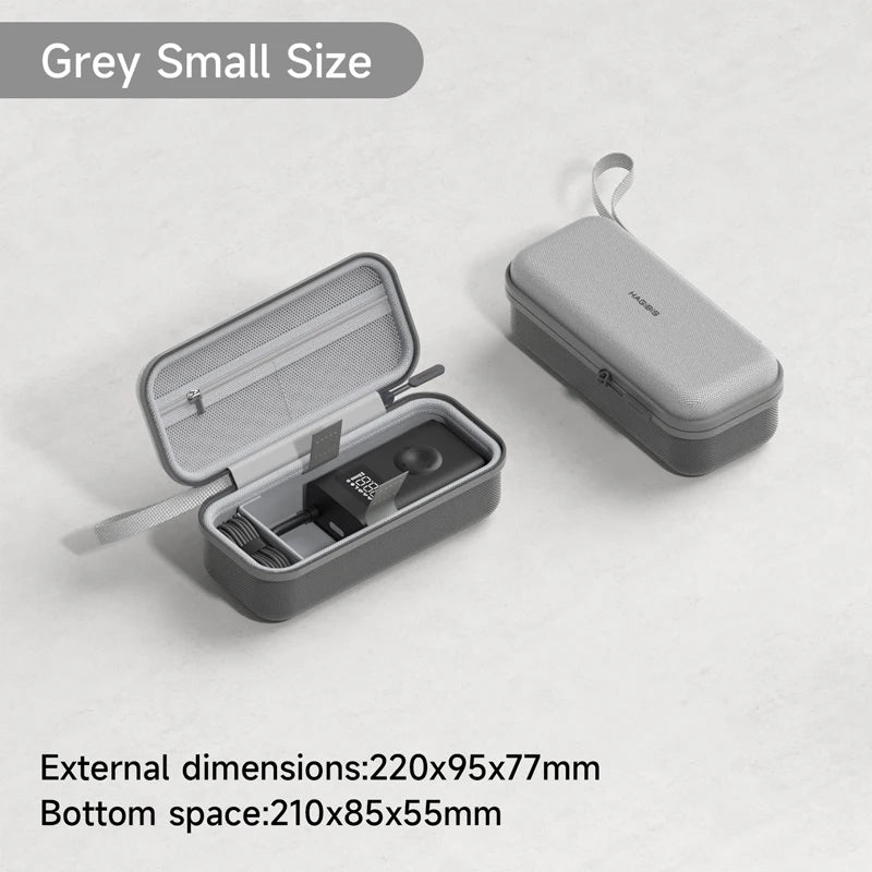 Gray travel case with open lid showing contents on a light gray background