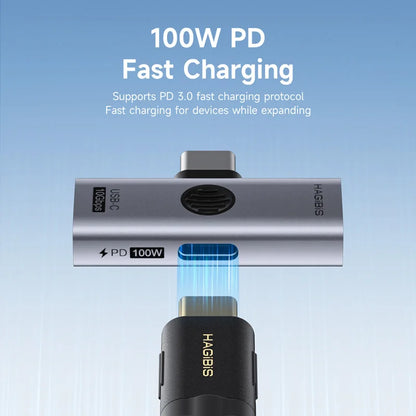 Fast charging adapter with '100W PD' text on a blue background