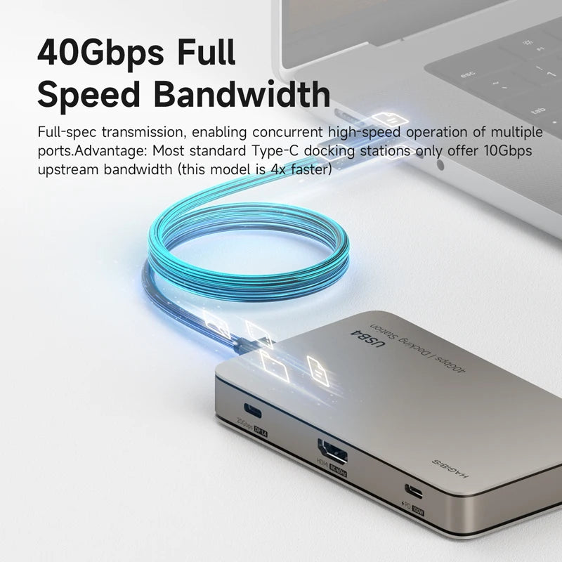 Laptop with a docking station and cable, highlighting 40Gbps full speed bandwidth feature.