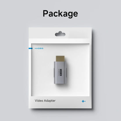 Video adapter in clear packaging on a gray background