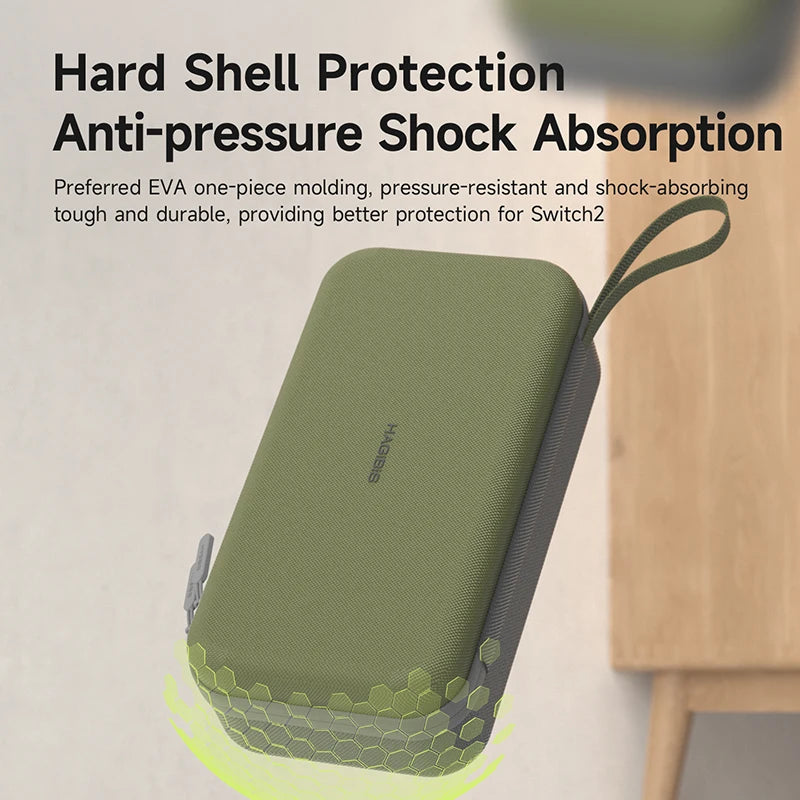 Green hard shell protection case for Switch2 with text about hard shell protection and anti-pressure shock absorption.