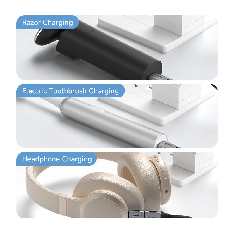Charging station with razor, electric toothbrush, and headphones on a white background