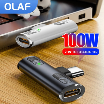 Two USB-C adapters on a wooden surface with 'OLAF' branding and '100W' text.