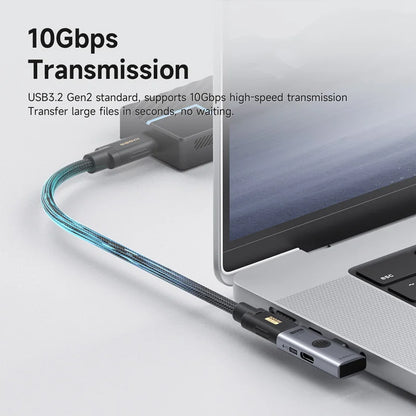 USB3.2 Gen2 cable connected to a laptop with text about 10Gbps transmission.