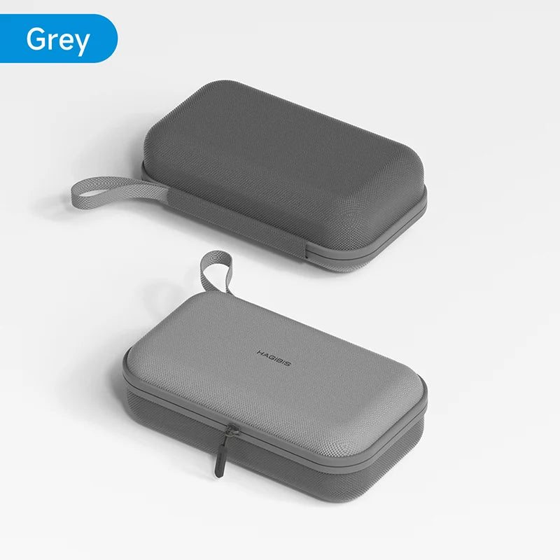 Two gray carrying cases on a light gray background