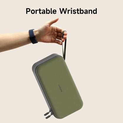 Green travel pouch with a portable wristband on a beige background