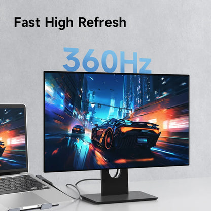 Monitor and laptop with high refresh rate display on a gray background