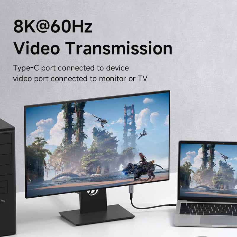 Monitor and laptop displaying a video game scene with text about 8K@60Hz video transmission.
