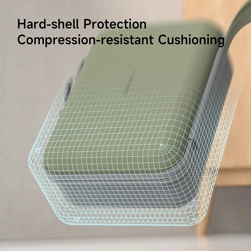 Green cushion with hard-shell protection and compression-resistant cushioning on a chair.