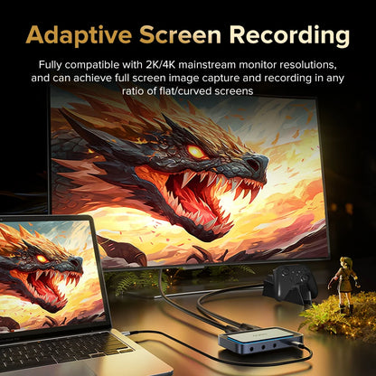Adaptive screen recording device with monitor and laptop displaying dragon artwork.