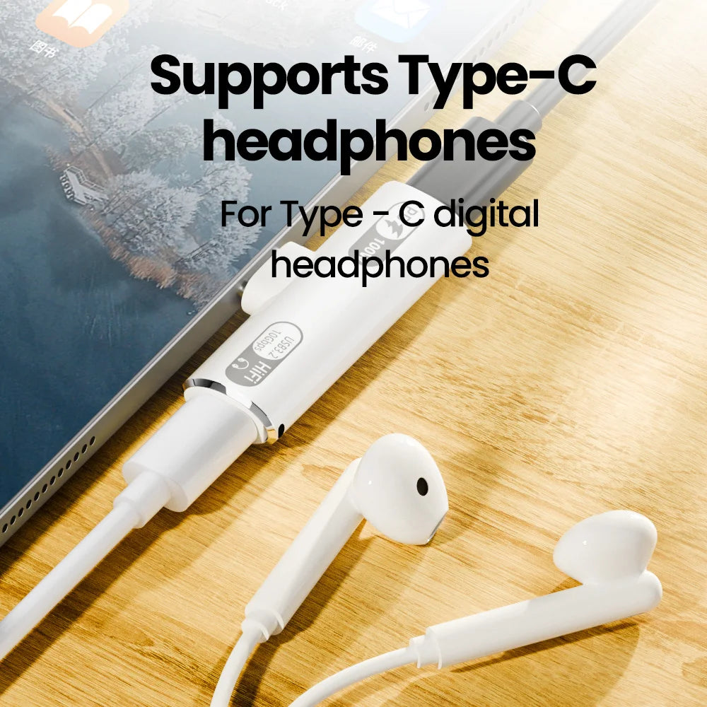 White Type-C headphones on a wooden surface with text indicating compatibility.