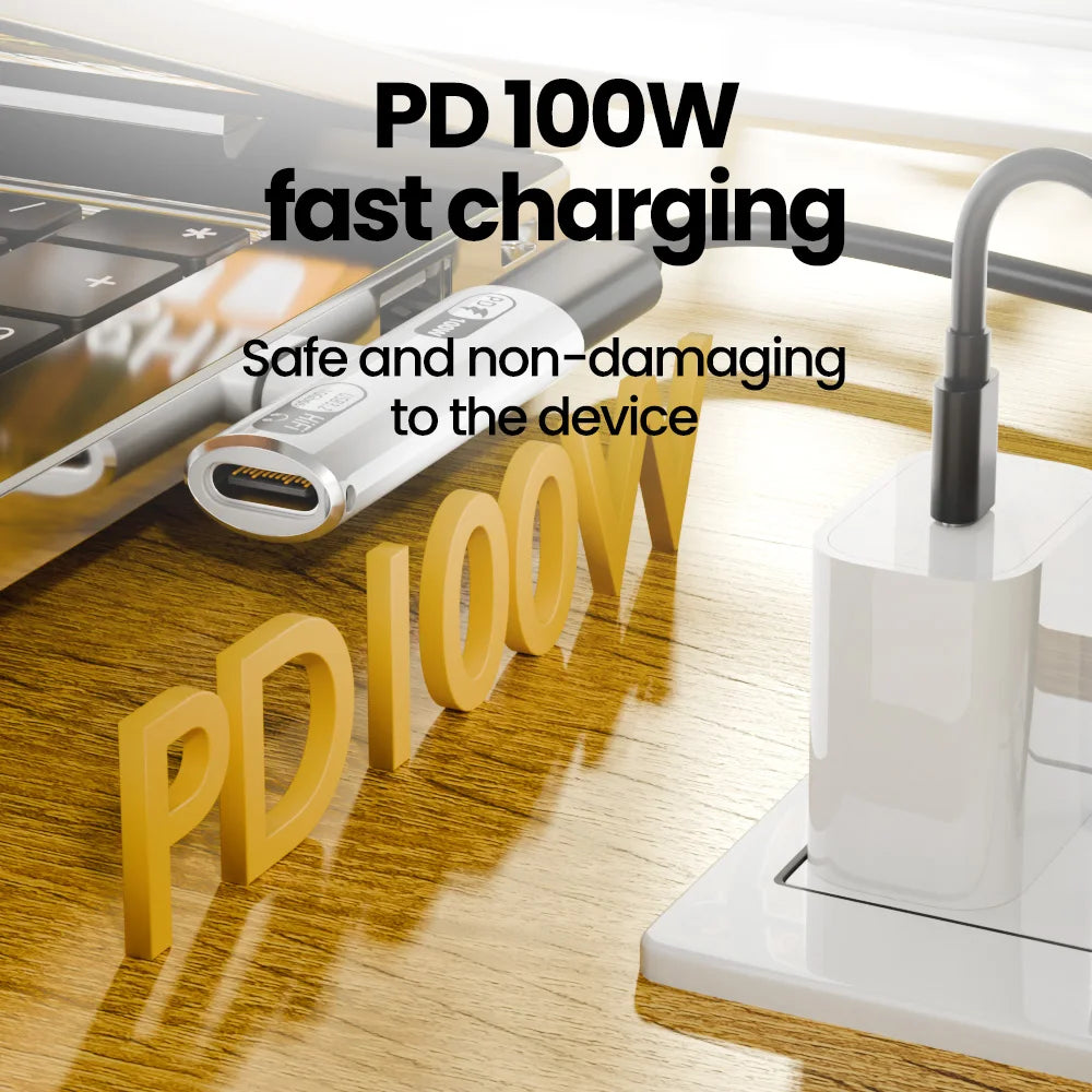 PD 100W fast charging cable with laptop and water faucet on a wooden surface