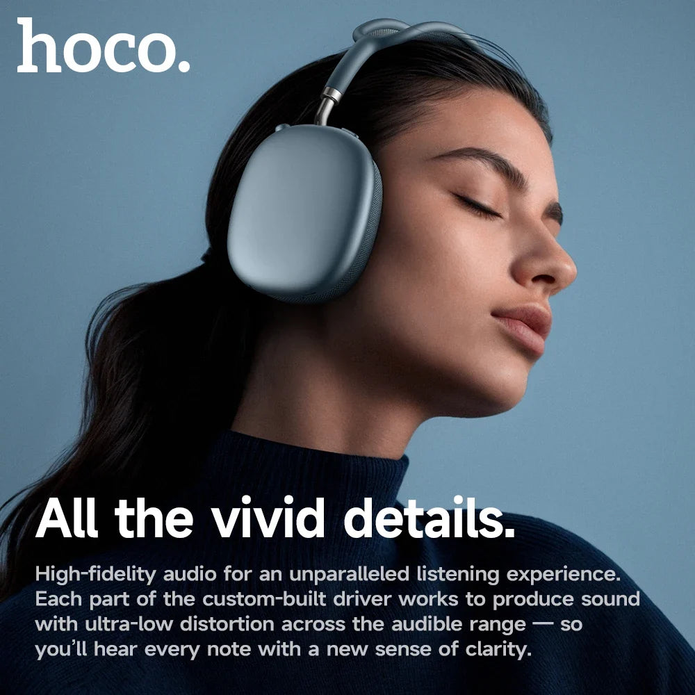 Woman wearing headphones with 'hoco.' branding and text about high-fidelity audio on a blue background.